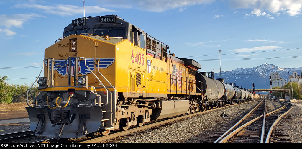 UP 6405 A Rebuilt C44ACM is The Rear DPU on a Empty Unit Train